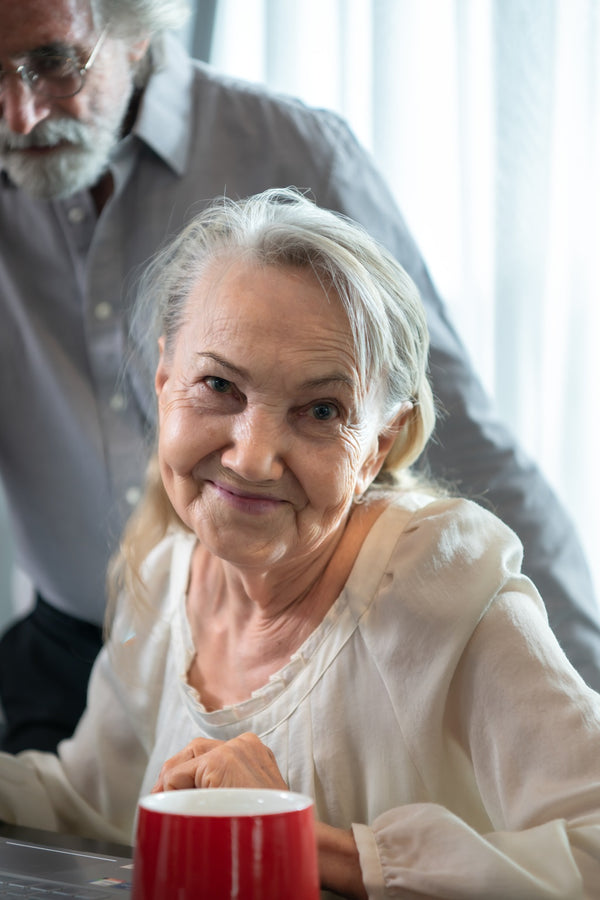 Smiling old woman - Nomo Room Monitoring System for Elderly