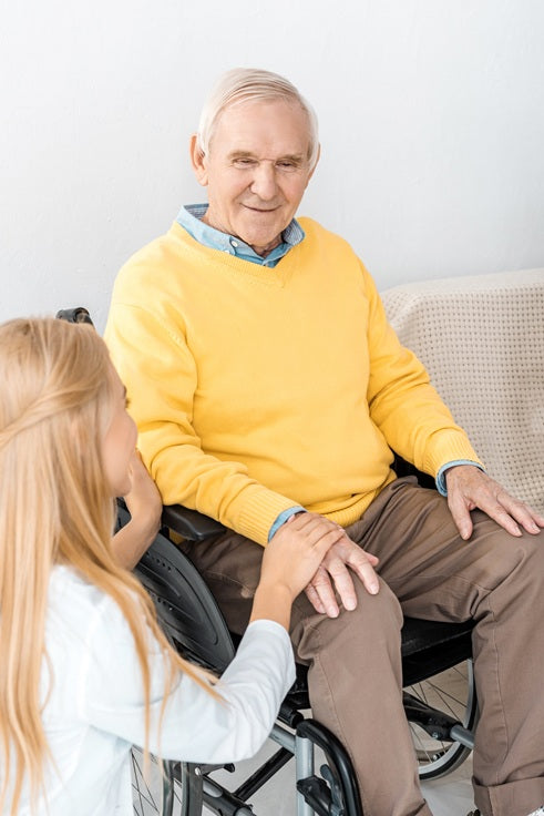 Elderly Man with Caregiver - Nomo Smart CareHome Monitoring for Elderly