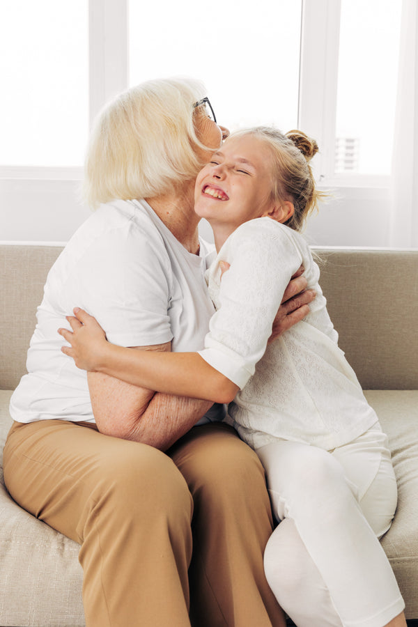 Happy Grandma with Grand Daughter - Nomo Smartcare Home Monitoring for Elderly