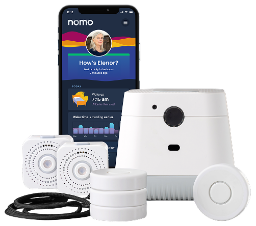 Nomo app on a phone beside the Hub, Satellites and Tags from the Essential Care Kit